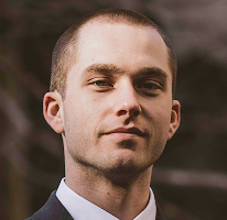 Thomas Whitfield, trading analyst and crypto market expert, headshot.