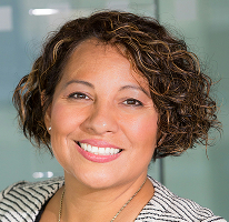 Claire Ashford, compliance head at a financial regulation firm, headshot.