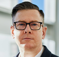 Alexander Hughes, CEO i członek kierownictwa firmy zajmującej się crypto trading, portret